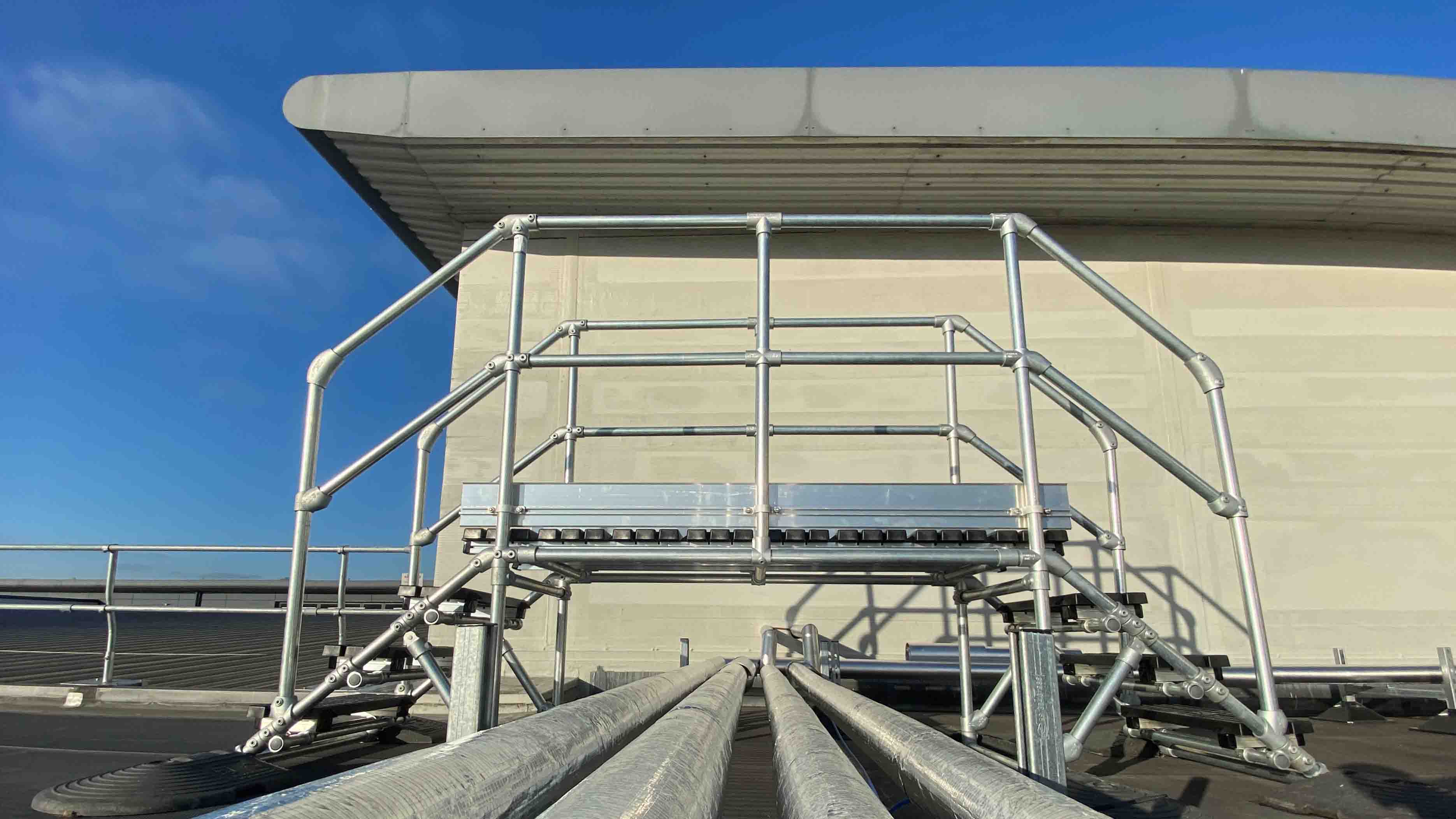 Step Over Roof Pipes