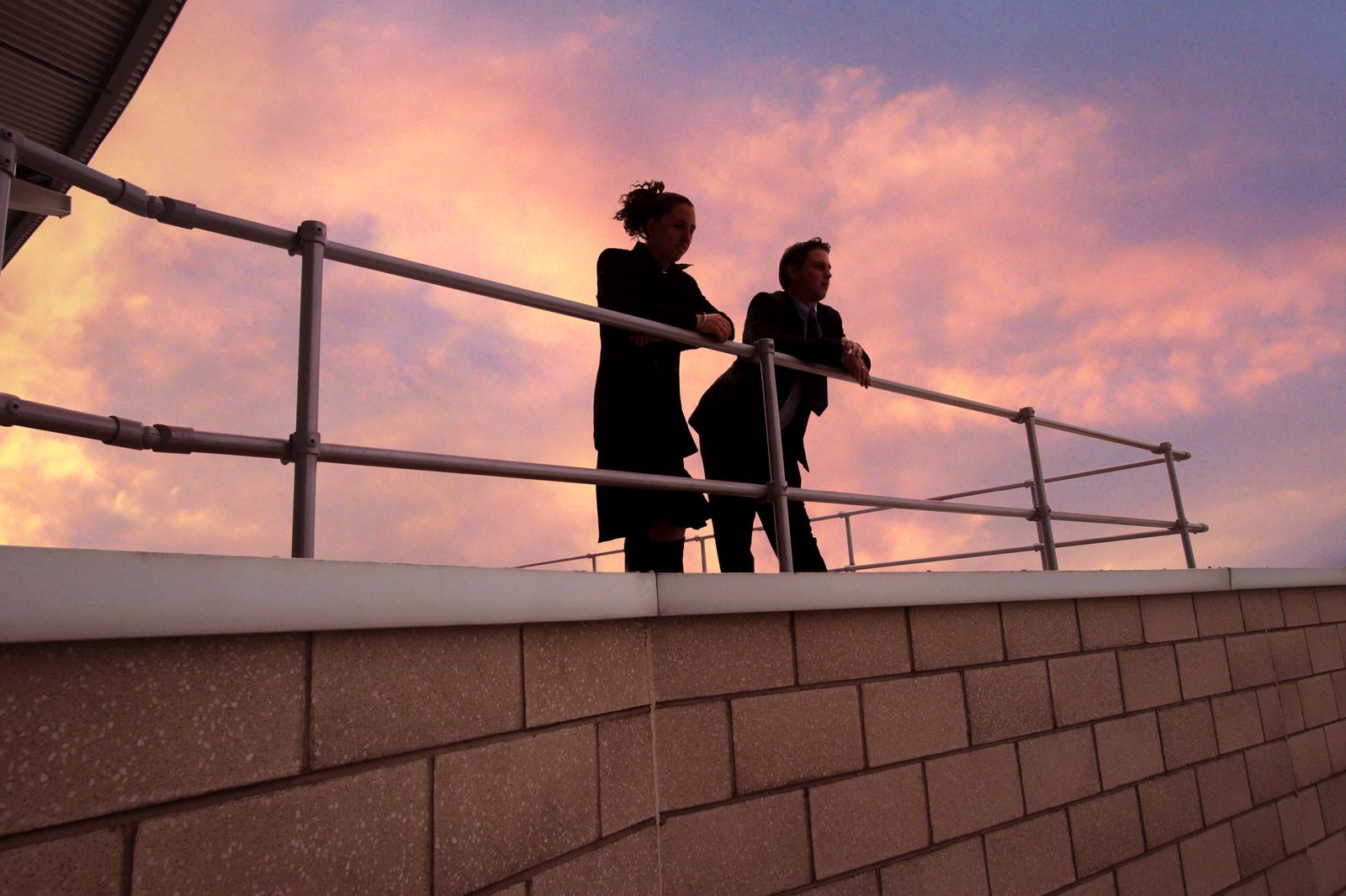 Public railing in use, showing why compliance and testing matter