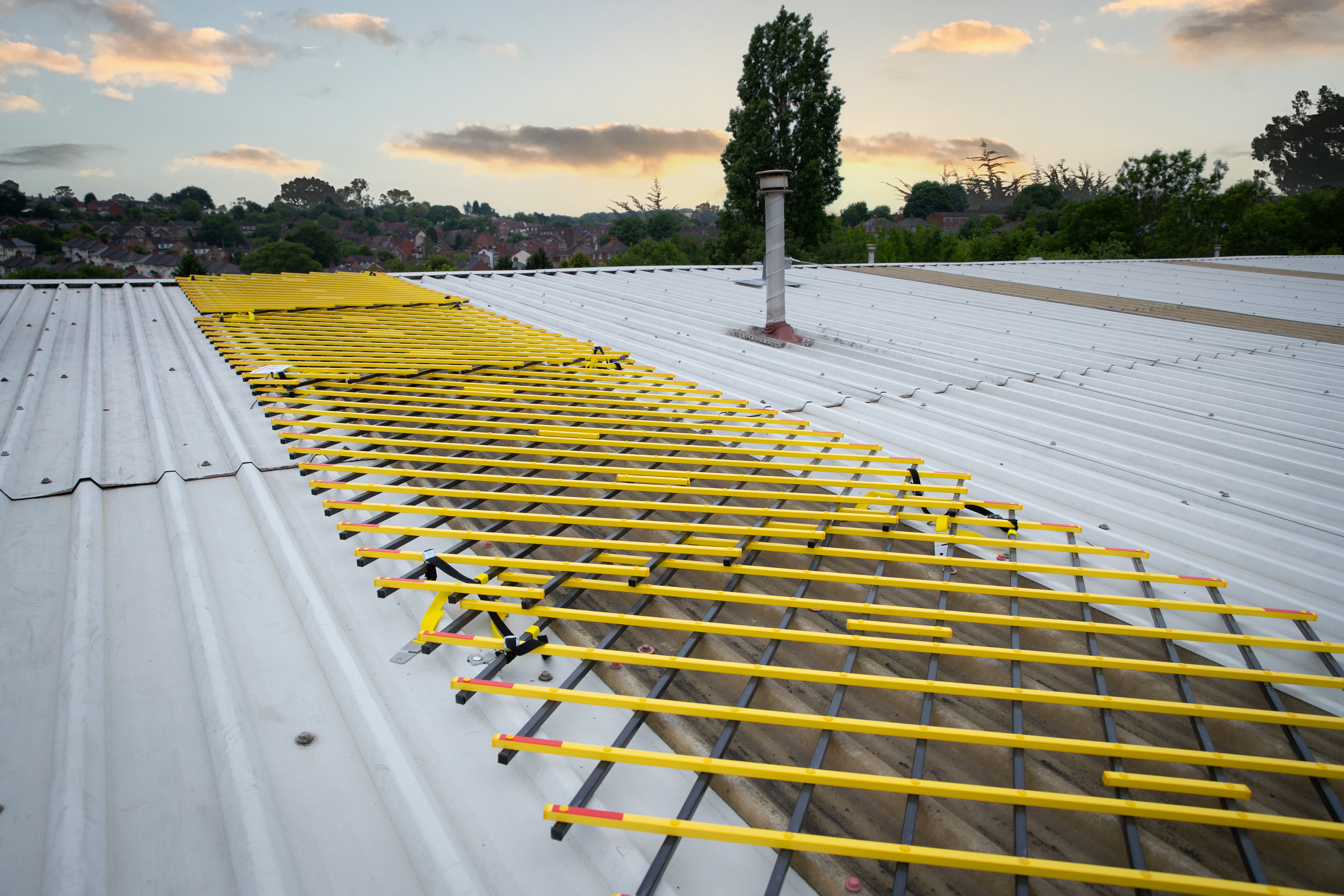 CoverLite By Kee Safety a temporary skylight cover made from Glass Reinforced Plastic (GRP), designed to prevent falls through fragile skylights during roof work.